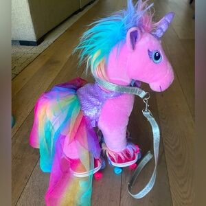 Build-a-Bear unicorn with outfits, shoes and roller skates.